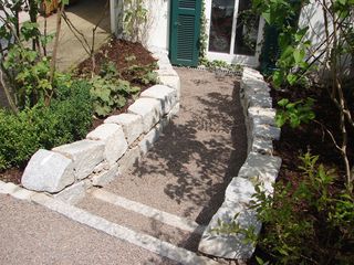 Graniteinfassung mit Stufenverlegung